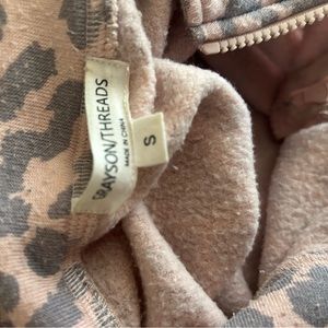 Pink animal print pullover